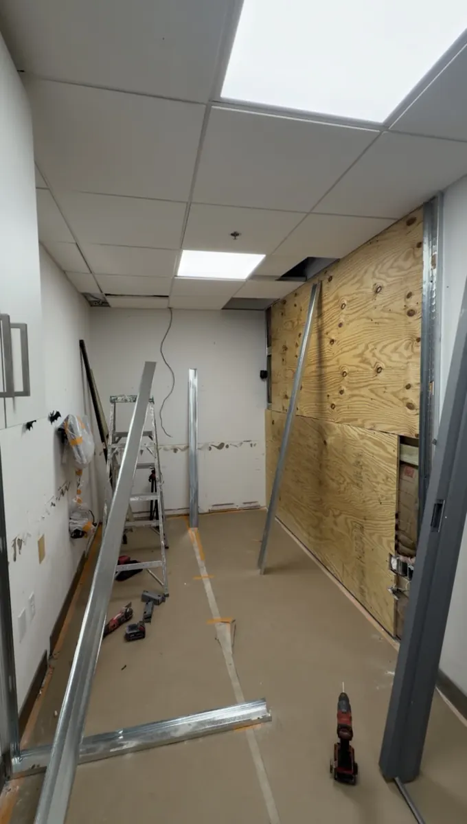 Before: Commercial door framing and installation