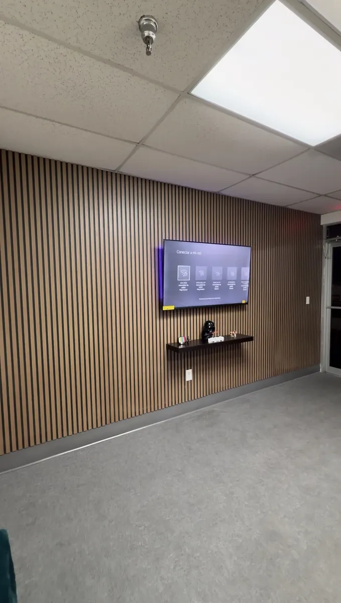 After: Commercial slat media wall