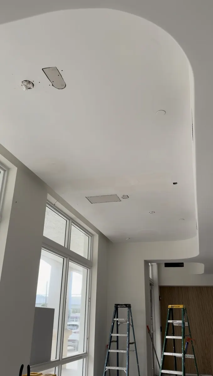 Before: Interior wood-slat ceiling