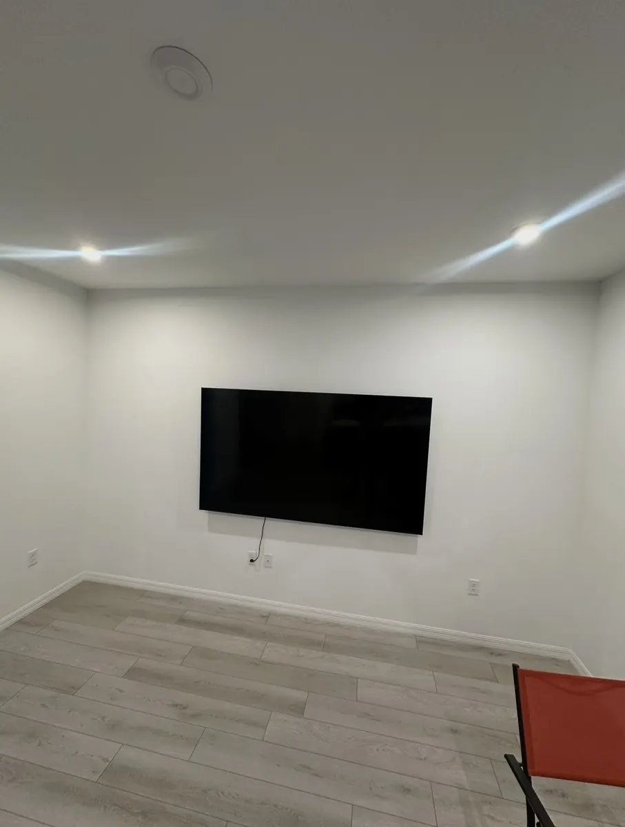 Before: Custom media wall and fireplace